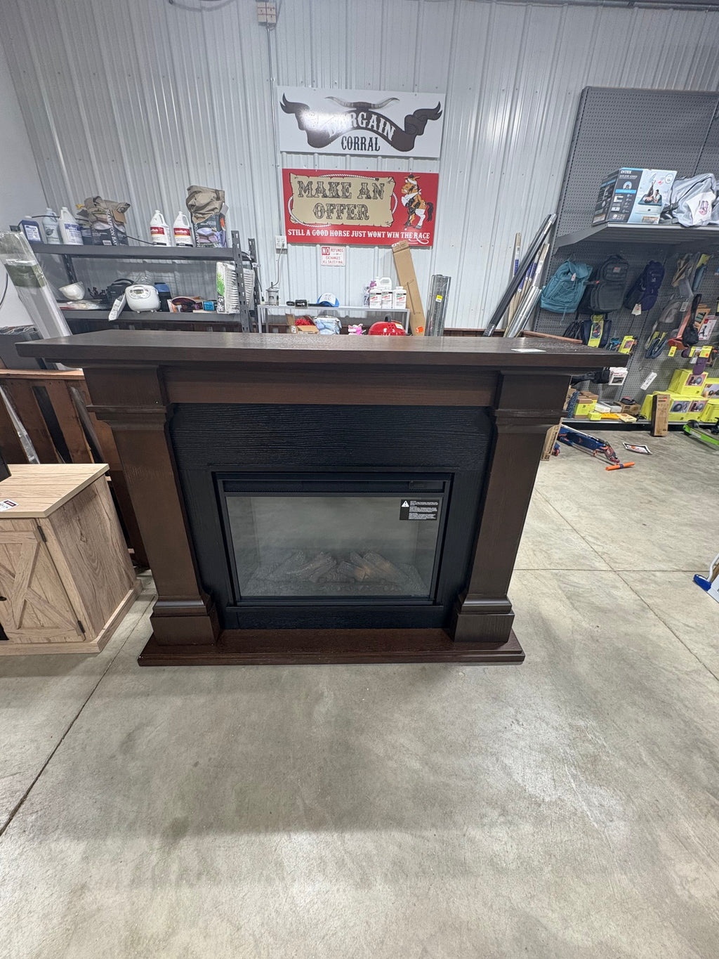 Brand new and fully assembled Real Flame Callaway 63 in. Grand Electric Fireplace in Chestnut Oak Chestnut oak finishing