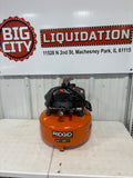 RIDGID 6 Gal. 150 PSI Portable Electric Oil-Free Jobsite Pancake Air Compressor with Dual Pressure Gauges and 2-Quick Couplers