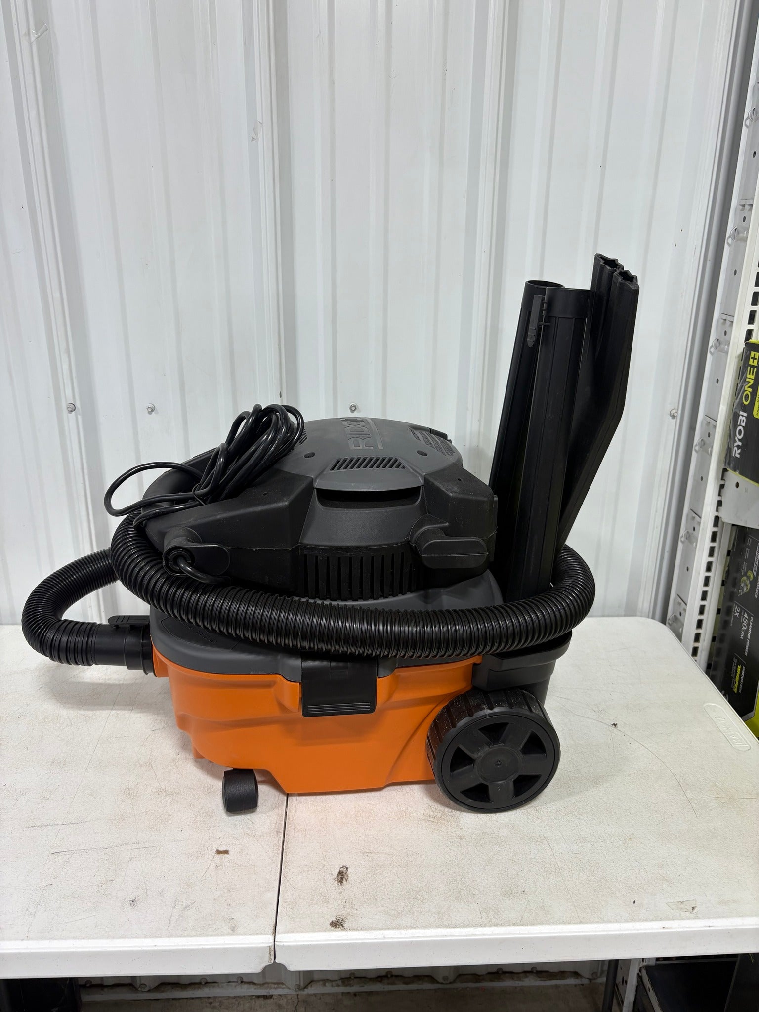 RIDGID 4 Gal. 5.0 Peak HP Portable Shop Vacuum Wet Dry Vac with Fine Dust Filter, Locking Hose and Attachments