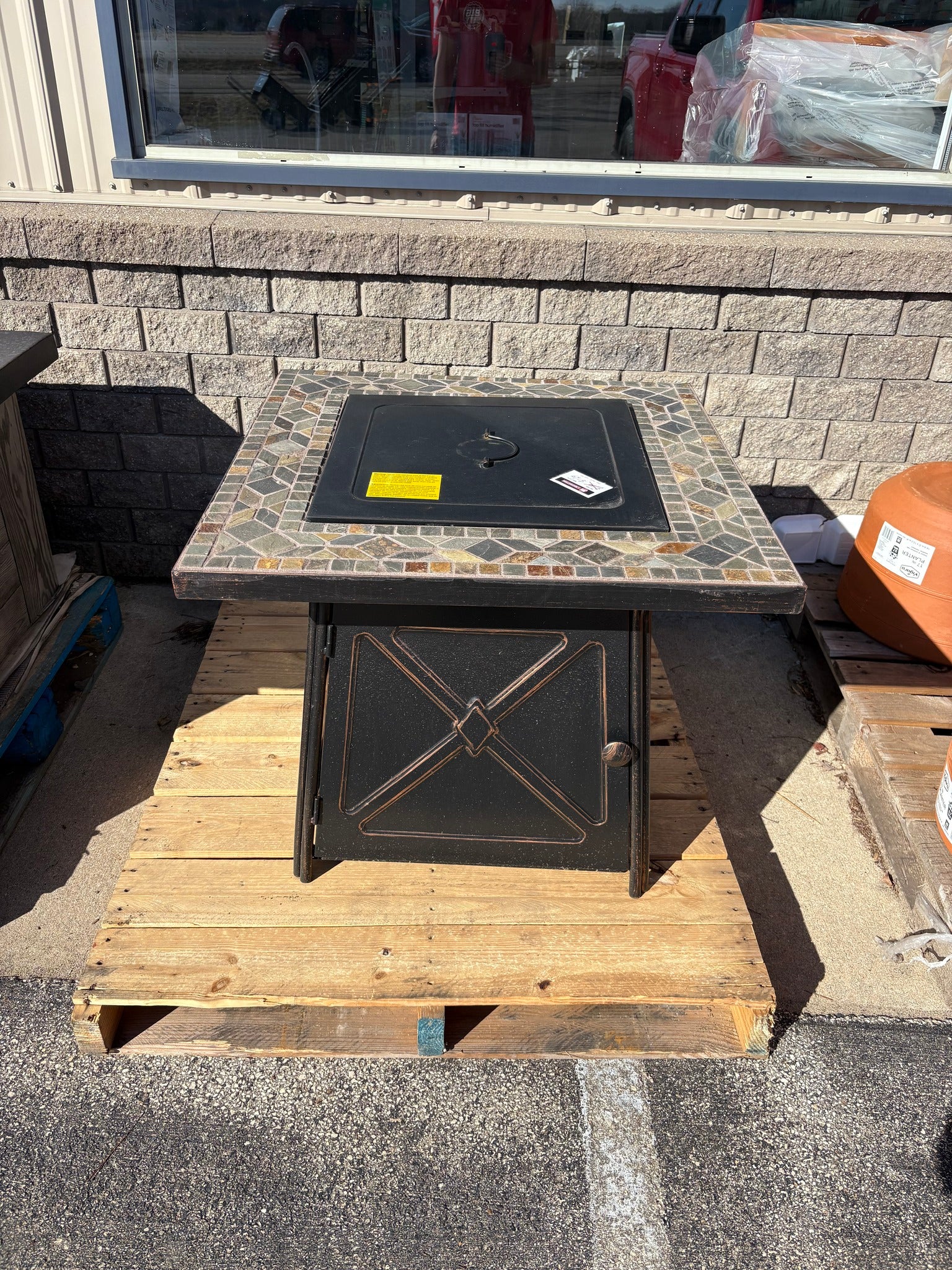 Brand new and fully assembled Hampton Bay Crossridge 30.00 in. W 50000 BTU Steel Propane Outdoor Fire Pit Table with Lava Rocks and Screen