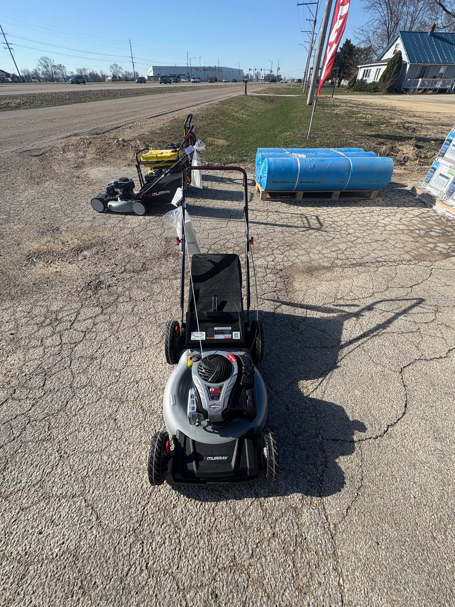 Murray 21 in. 140 cc Briggs and Stratton Walk Behind Gas Push Lawn Mower with Height Adjustment and with Mulch Bag.