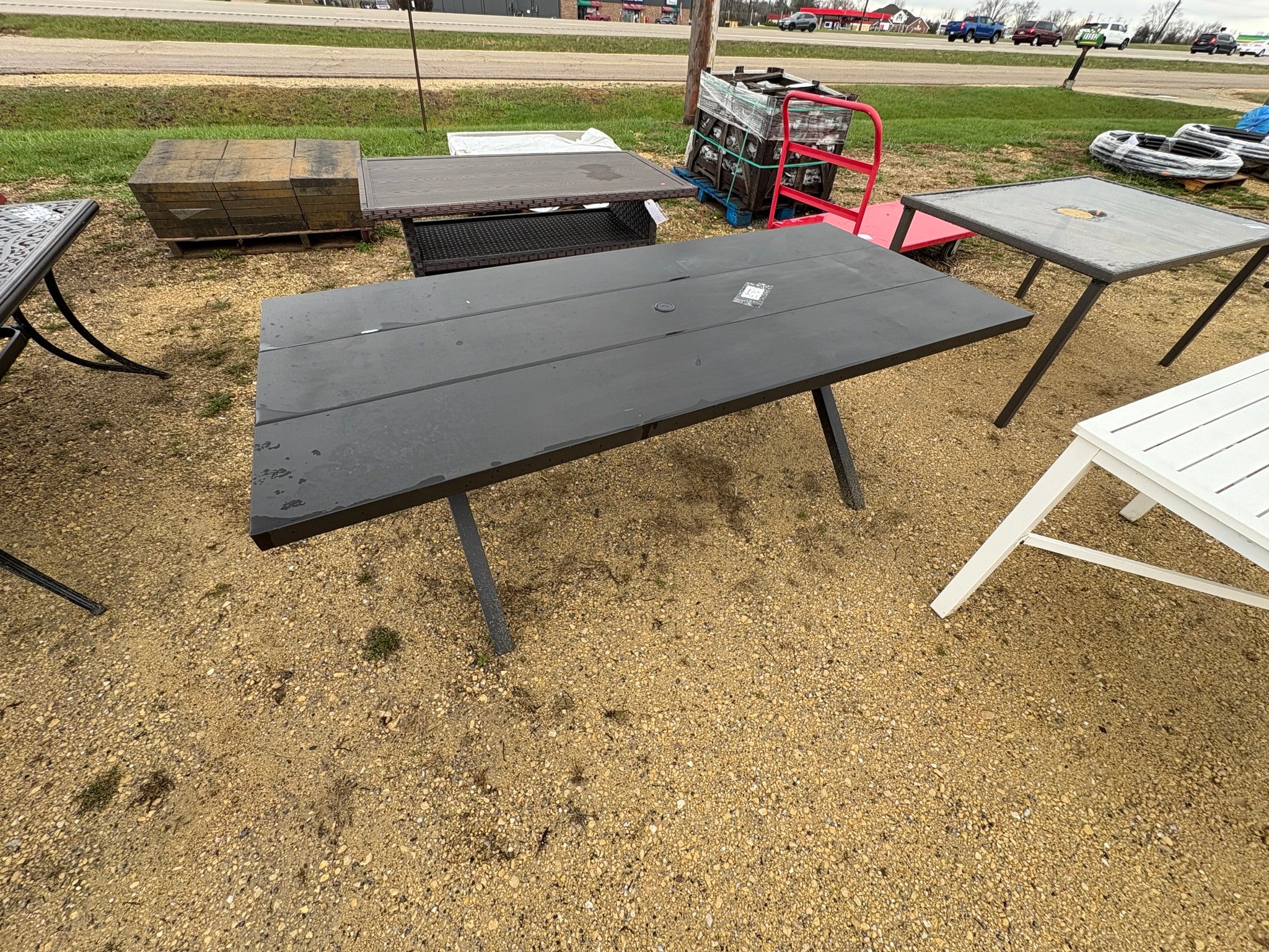 Brand new Metal Outdoor Dining Table. Has paint chipping, see pictures