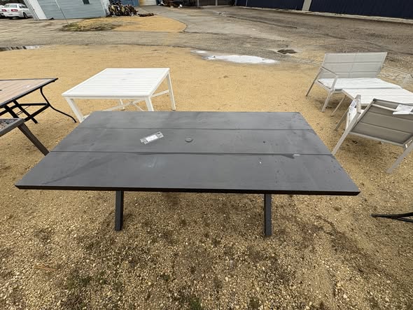 Brand new Metal Outdoor Dining Table. Has paint chipping, see pictures