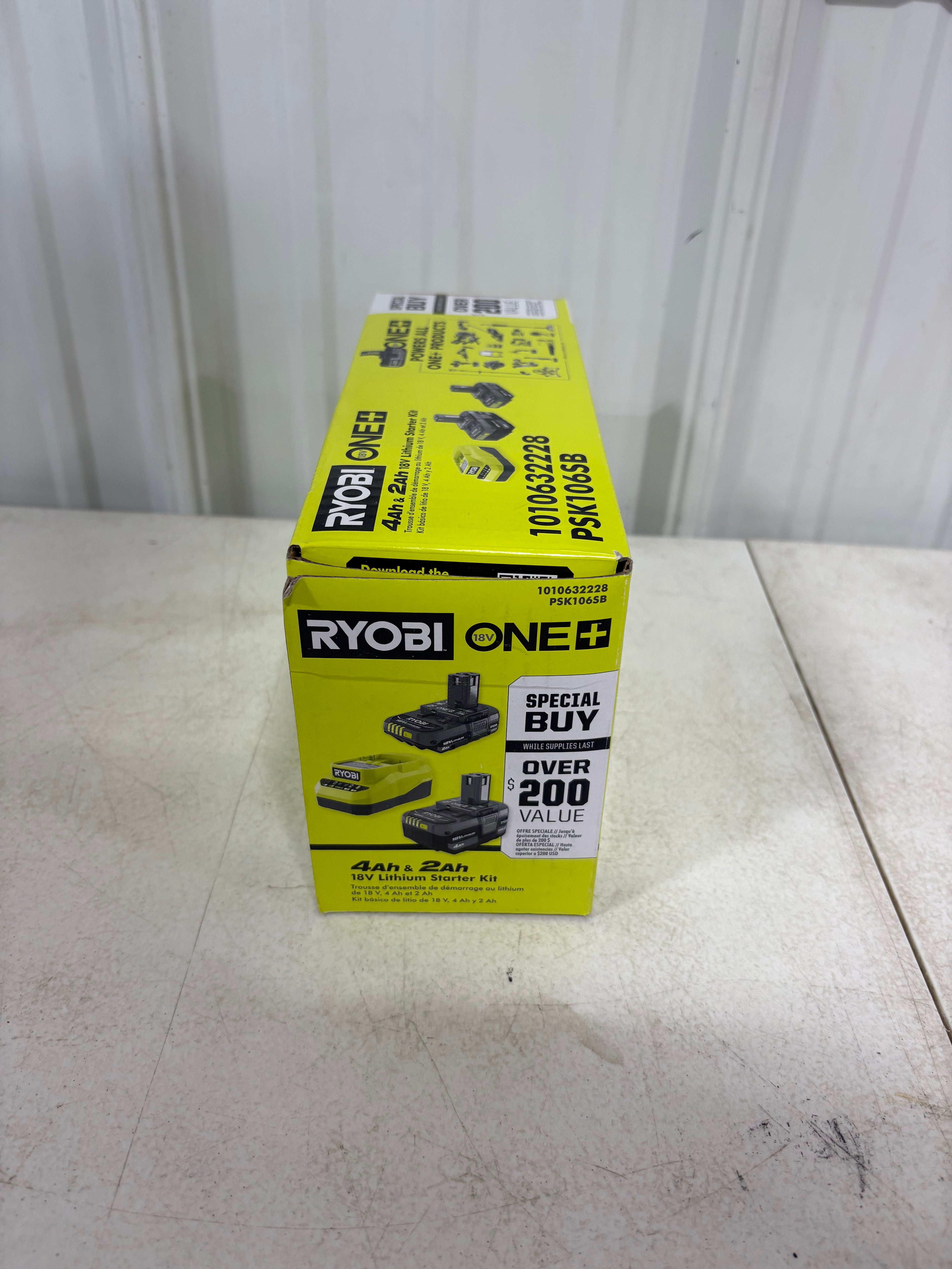 Brand new RYOBI ONE+ 18V Lithium-Ion Starter Kit with 2.0 Ah Battery, 4.0 Ah Battery, and Charger