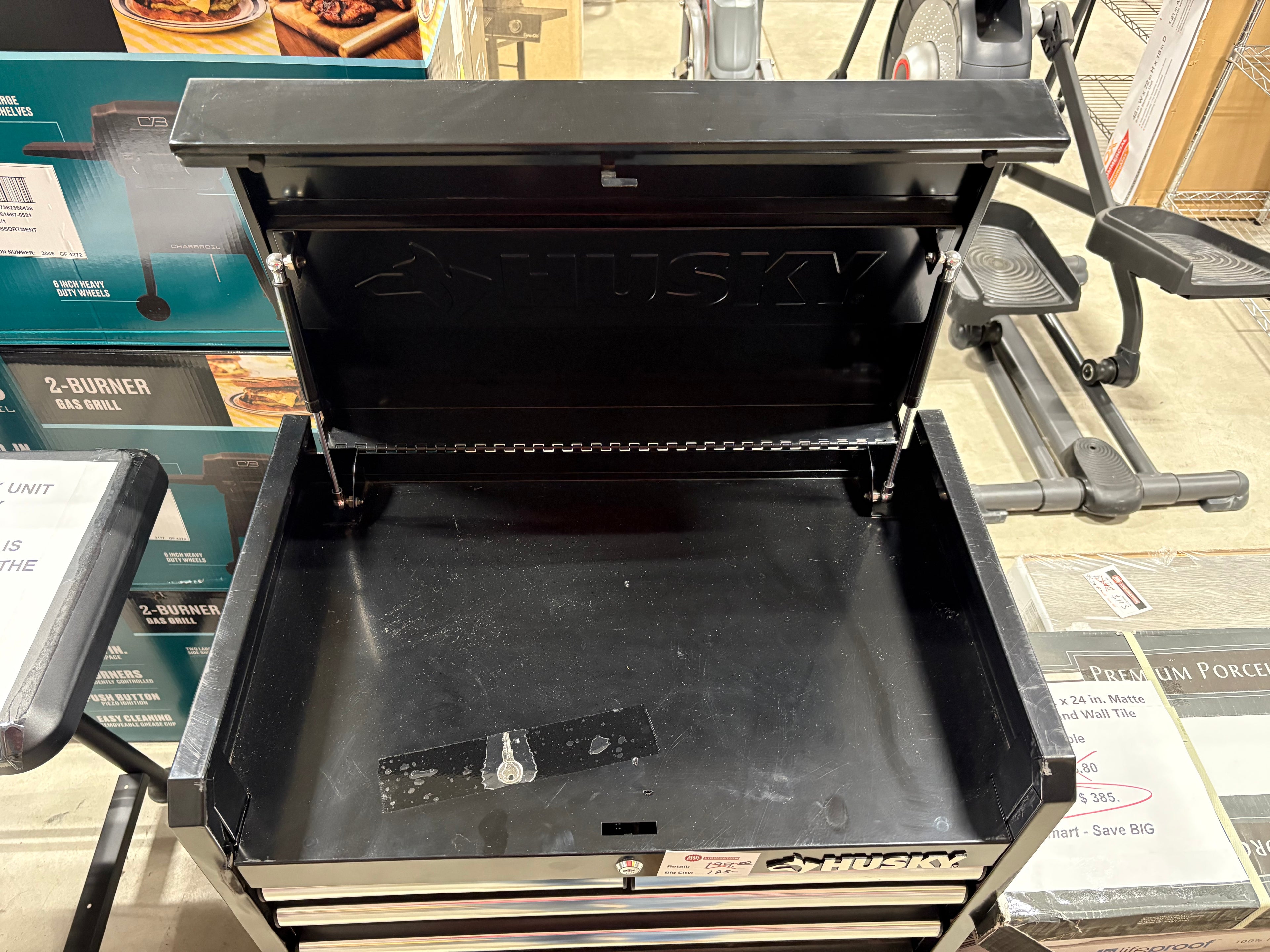 Brand new Husky Tool Storage 26 in. W x 16 in. D 5-Drawer Gloss Black Top Tool Chest. Has scratches and dents, see pictures