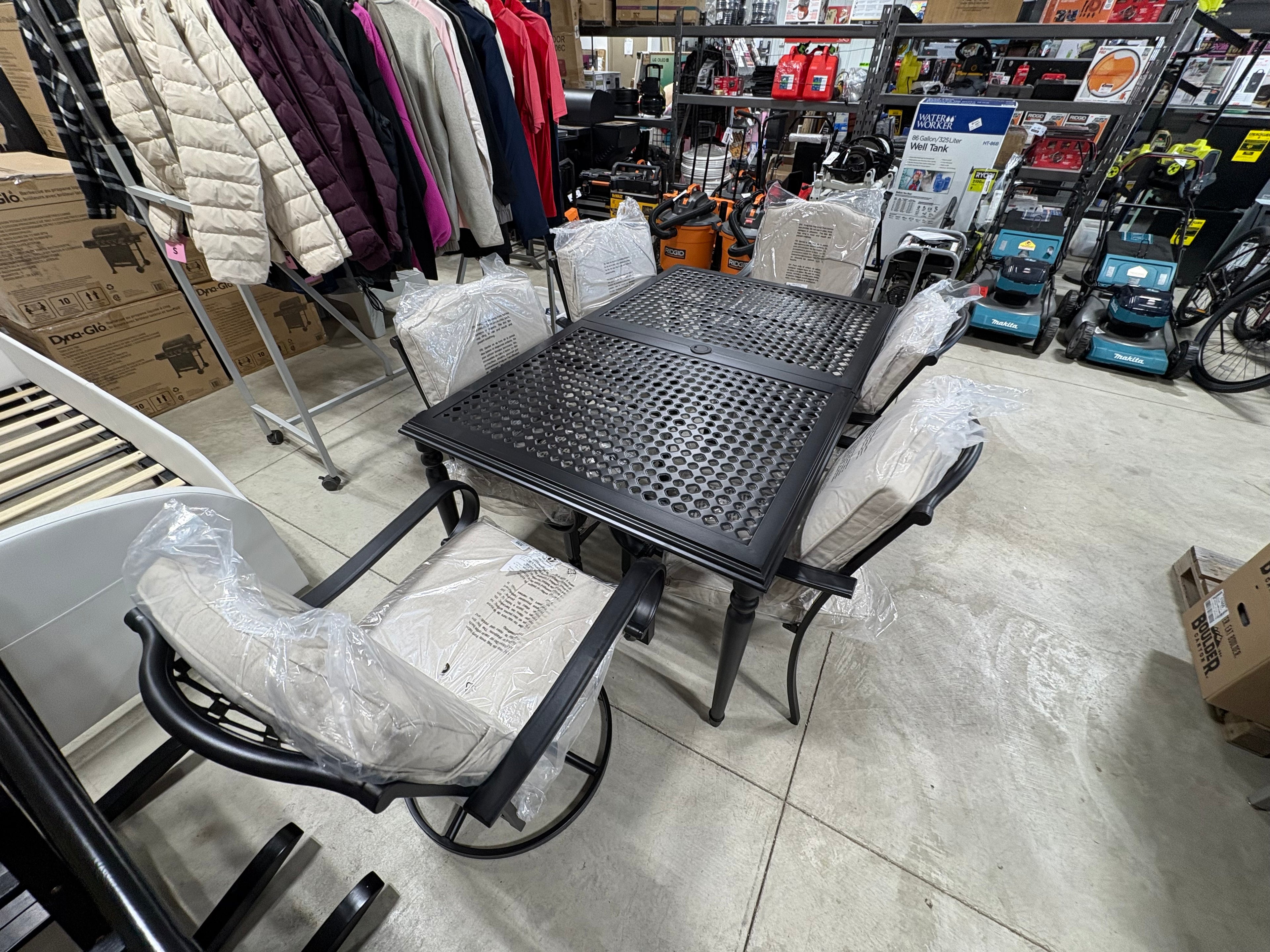 Brand new and fully assembled Hampton Bay Laurel Oaks 7-Piece Dark Brown Steel Outdoor Patio Dining Set with Cushion Guard Putty Cushions