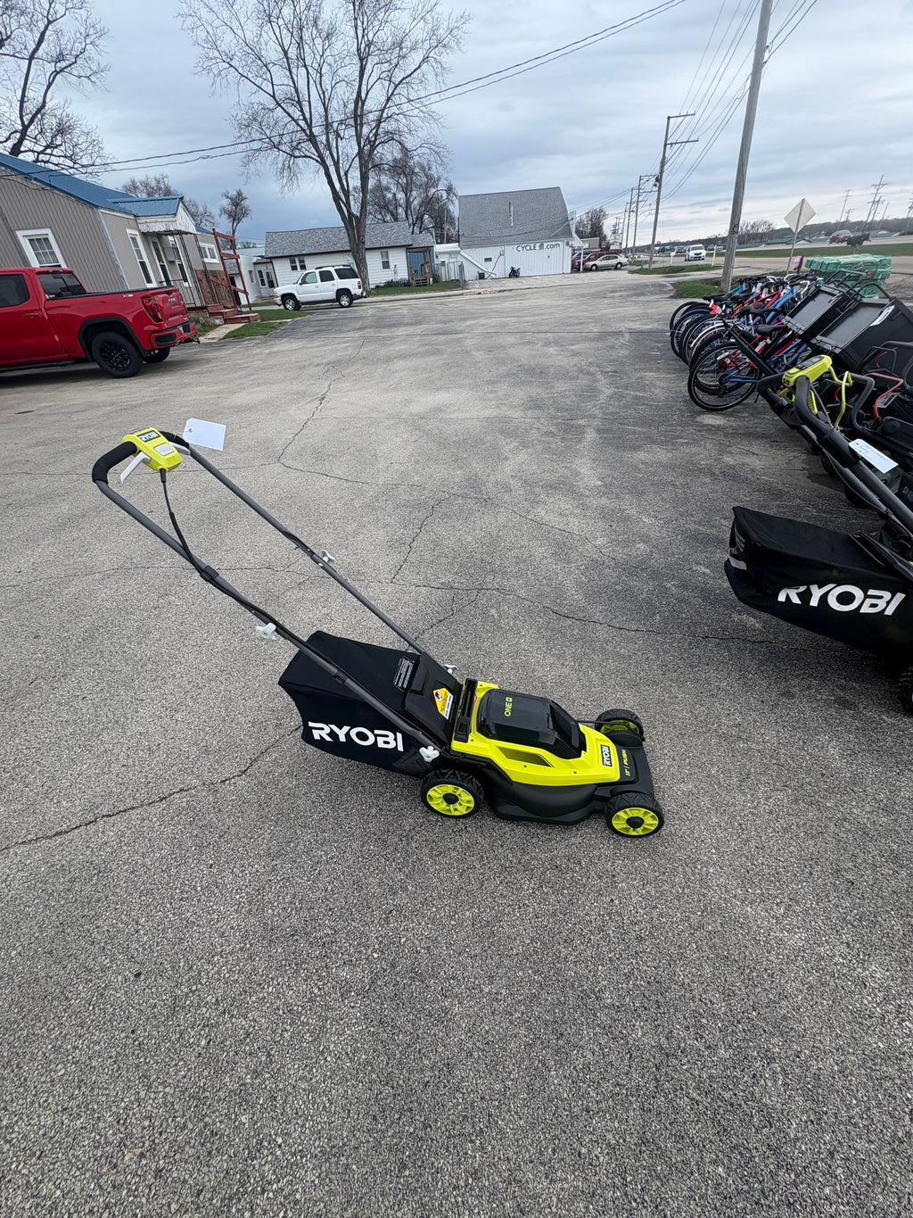 Brand new RYOBI ONE+ 18V 13 in. Cordless Battery Walk Behind Push Lawn Mower with 4.0 Ah Battery and Charger