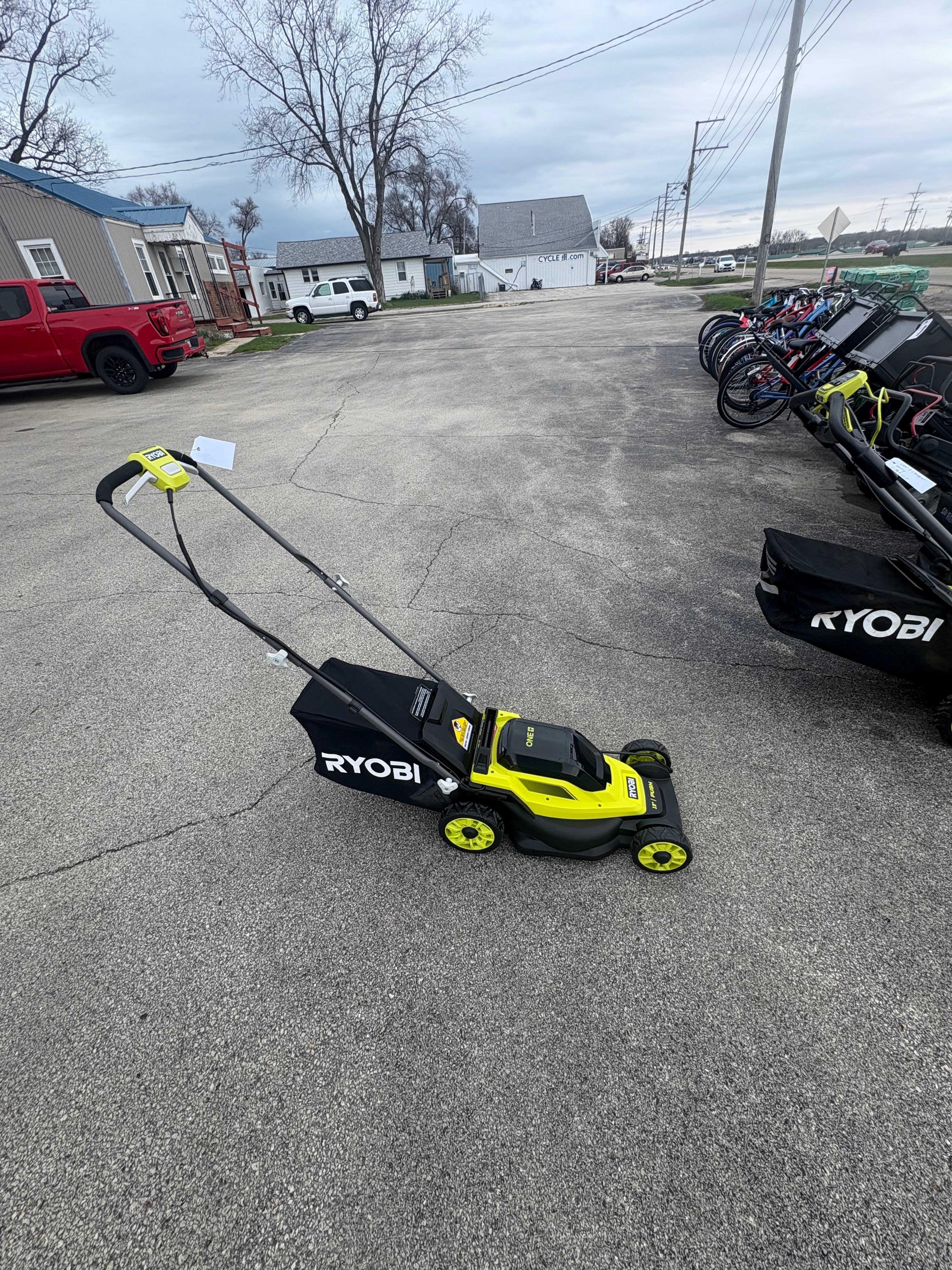 Brand new RYOBI ONE+ 18V 13 in. Cordless Battery Walk Behind Push Lawn Mower with 4.0 Ah Battery and Charger
