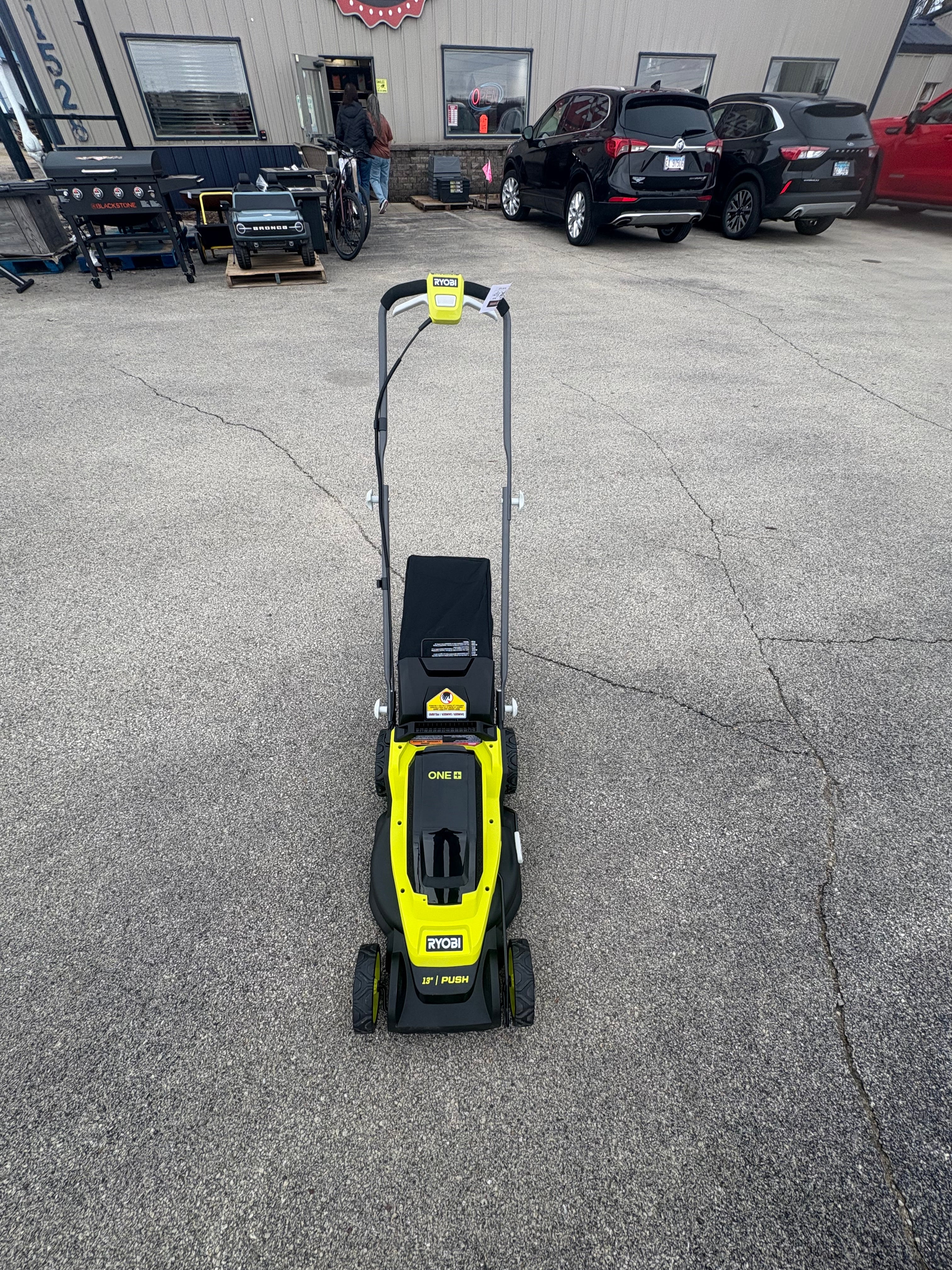 Brand new RYOBI ONE+ 18V 13 in. Cordless Battery Walk Behind Push Lawn Mower with 4.0 Ah Battery and Charger