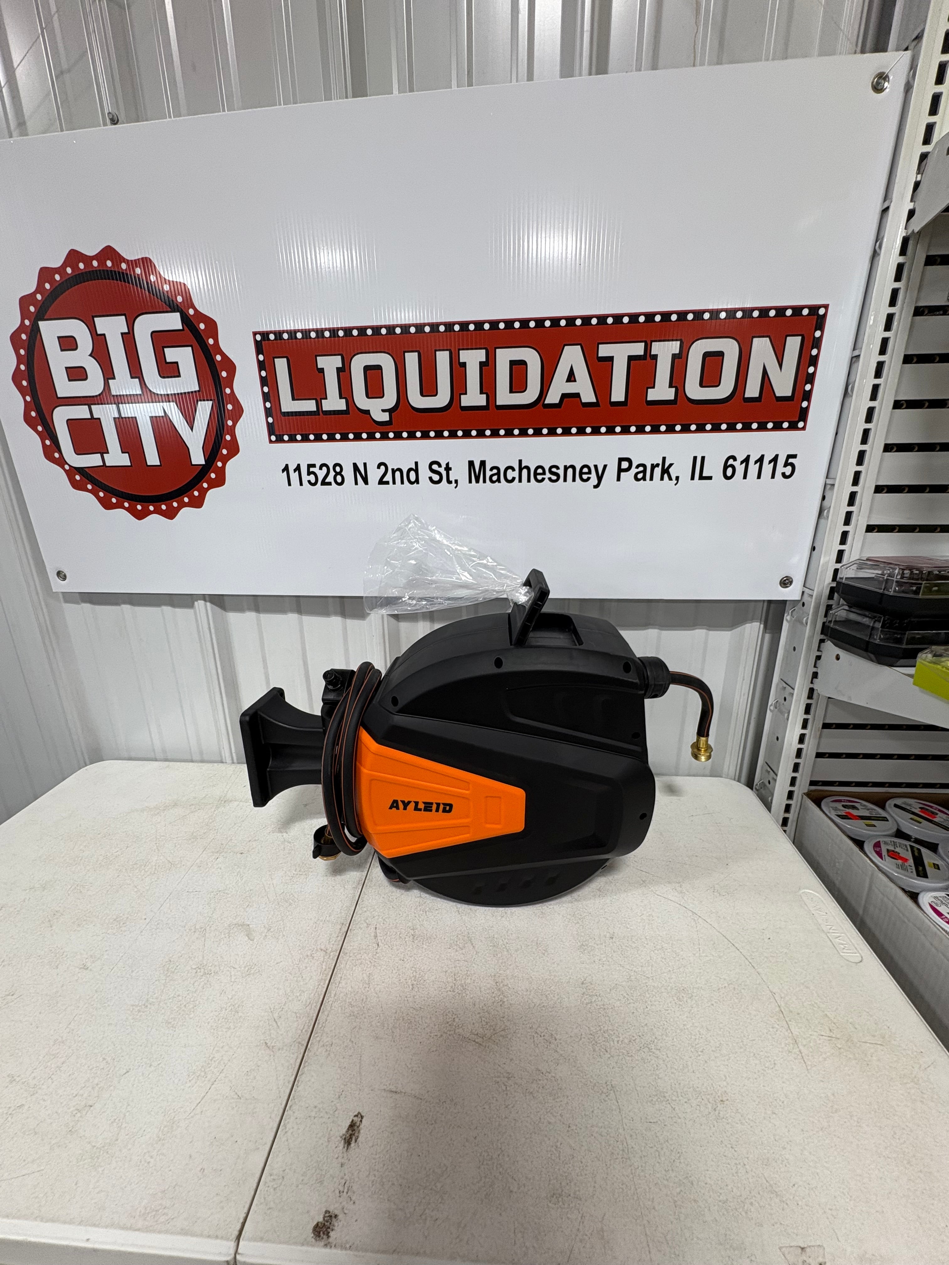 Brand new Ayleid Retractable Garden Hose Reel,1/2 in x 65 ft Wall Mounted Hose Reel, with 9- Function Sprayer Nozzle