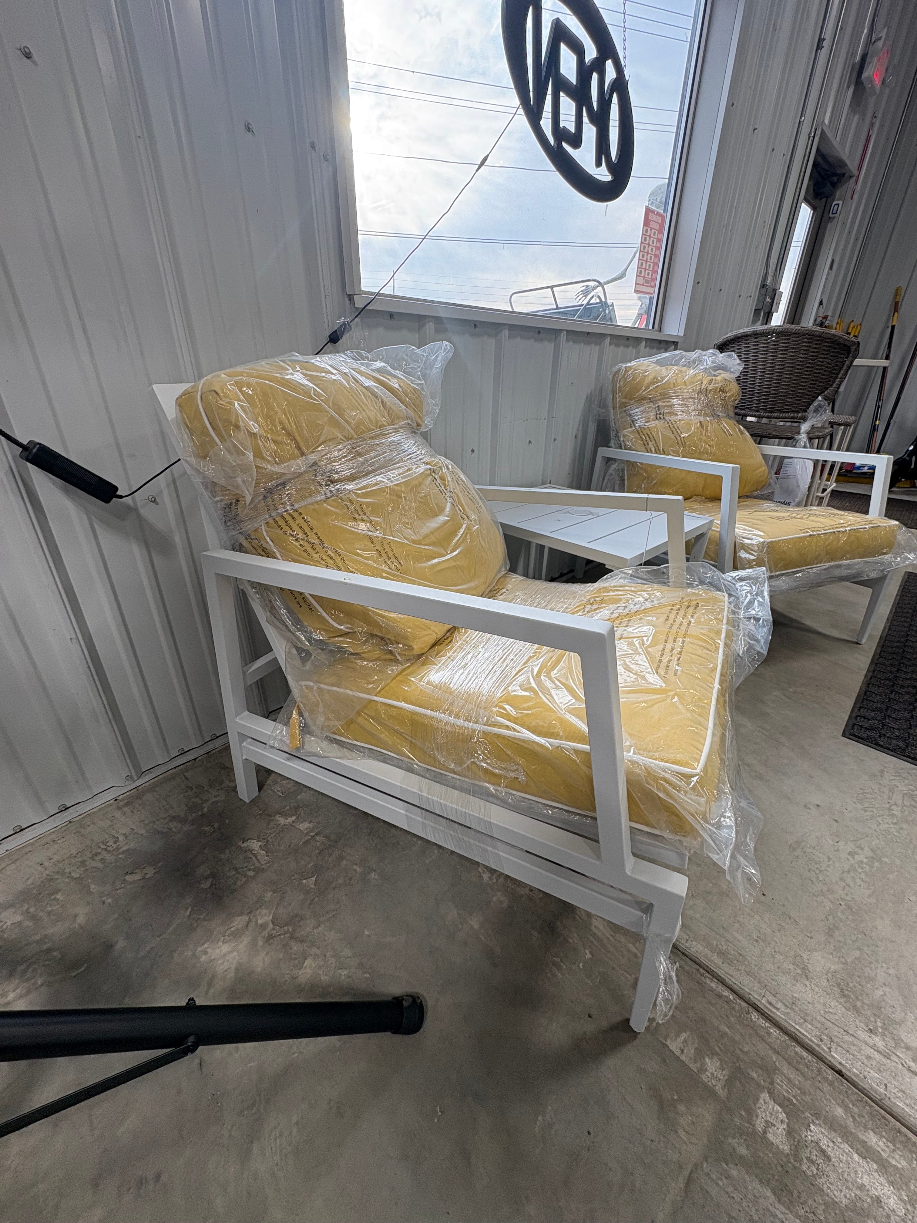 Brand new and fully assembled Hampton Bay Willow Cay White 3-Piece Steel Outdoor Conversation Set with CushionGuard Yellow Cushions