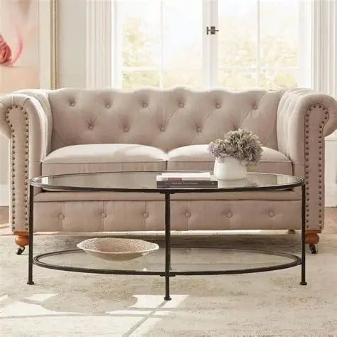 Brand new and fully assembled Home Decorators Collection Bella Large Oval Antique Bronze Metal and Glass Coffee Table with Shelf (46 in. W x 18 in. H)